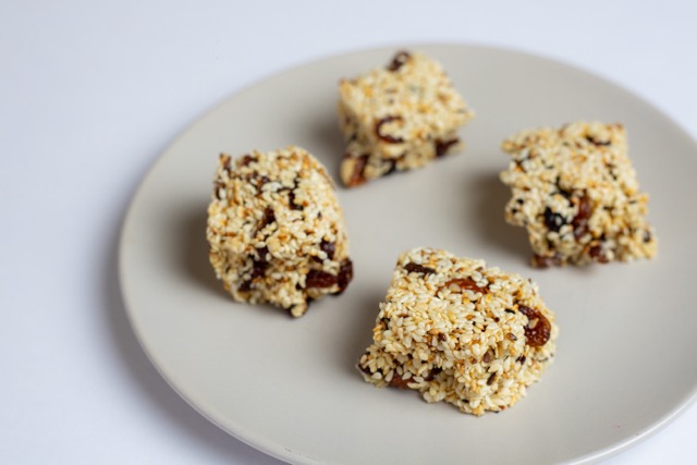 Sesame bites stacked on top of each other